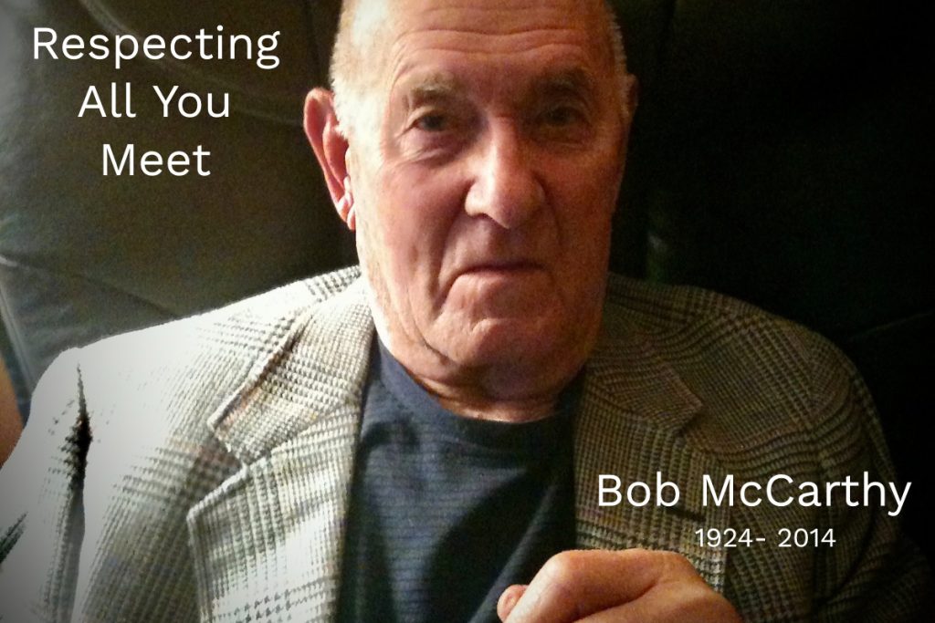 Photo of Bob McCarthy with caption of "Respecting All You Meet."